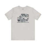 Legends Always Leak a Little tee featuring a vintage Land Rover Series II graphic on a soft cotton shirt.