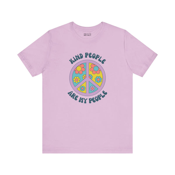 Premium soft tee featuring a floral peace sign with the text 'Kind People Are My People' on a light purple background.
