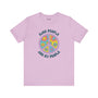 Premium soft tee featuring a floral peace sign with the text 'Kind People Are My People' on a light purple background.