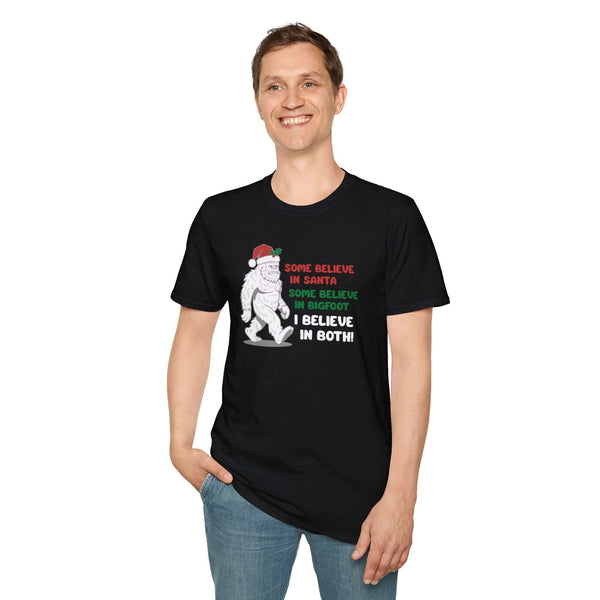 Believe in Santa and Bigfoot tee featuring a cheerful Bigfoot in a Santa hat with humorous text.