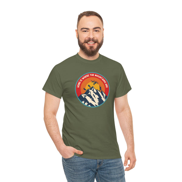 Man wearing Home is Where the Mountains Are athletic tee, featuring colorful PNW design with mountains and adventure motifs.