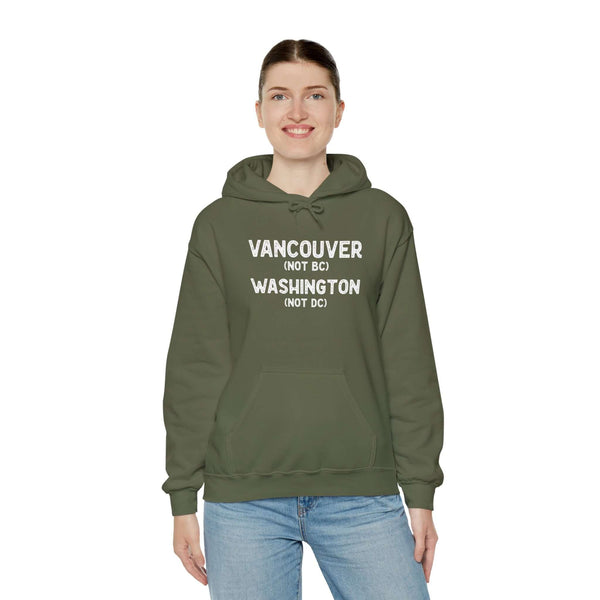 Green hoodie featuring 'Vancouver (NOT BC) Washington (NOT DC)' text for proud Vancouverites