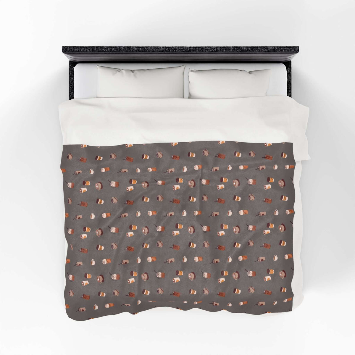 The Daily Grind Coffee Lovers Lightweight Cozy Blanket featuring coffee designs on a warm, cozy fabric.