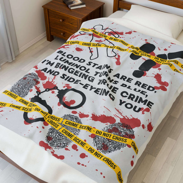 The Crime Scene Snuggle Lightweight Blanket for True Crime Lovers featuring crime scene design and clever poem.
