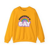 Homophobia Is Gay sweatshirt in vibrant yellow with rainbow and cloud design, promoting pride and positivity.