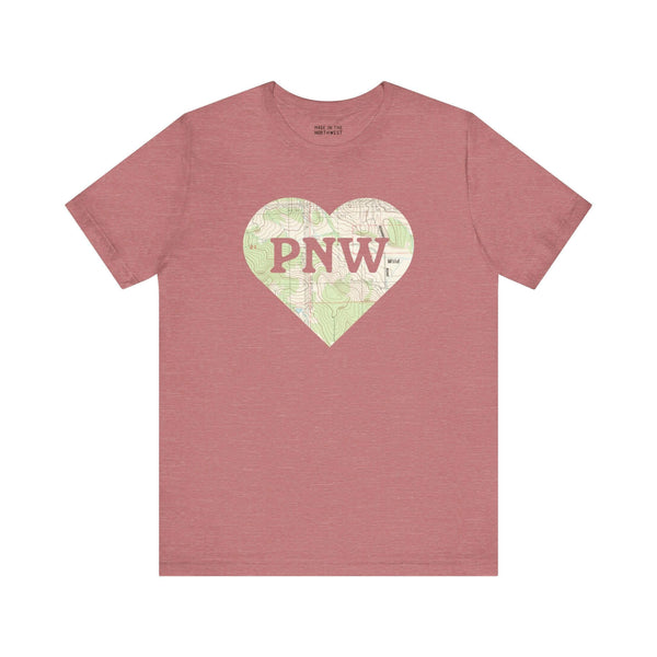 PNW Explorer's Heart Soft Tee with topo map heart design featuring "PNW" center text, in a rustic maroon shade.