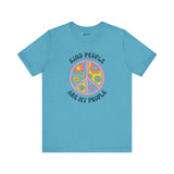 Light blue premium tee featuring a floral peace sign and the text 'Kind People Are My People'.