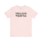 Home Is in Seattle Tee featuring the phrase 'Home is in Seattle' with graphics, showcasing PNW style.