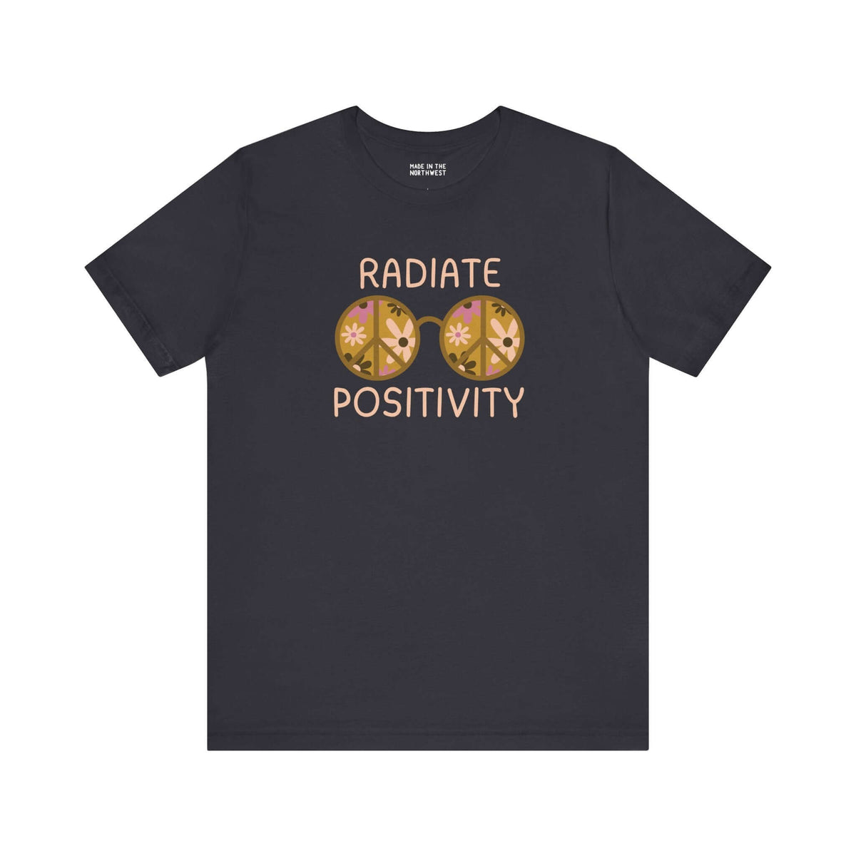 Black premium tee featuring vibrant 'Radiate Positivity' design with floral glasses, perfect for spreading good vibes.