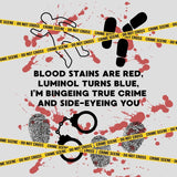 The Crime Scene Snuggle Lightweight Blanket for True Crime Lovers featuring crime scene tape and blood splatter design.