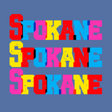 Colorful Spokane tee design with bold block letters showcasing the city name in vibrant hues.