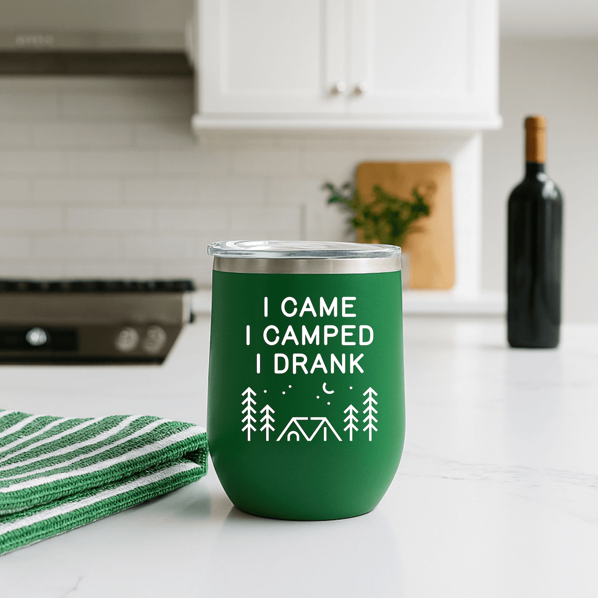 I Came, I Camped, I Drank Camping Outdoor Wine Tumbler 12 oz in a modern kitchen setting with a green design.