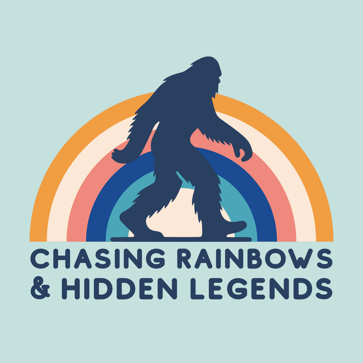 Chasing Rainbows and Hidden Legends tee featuring a Sasquatch graphic and vibrant rainbow design.