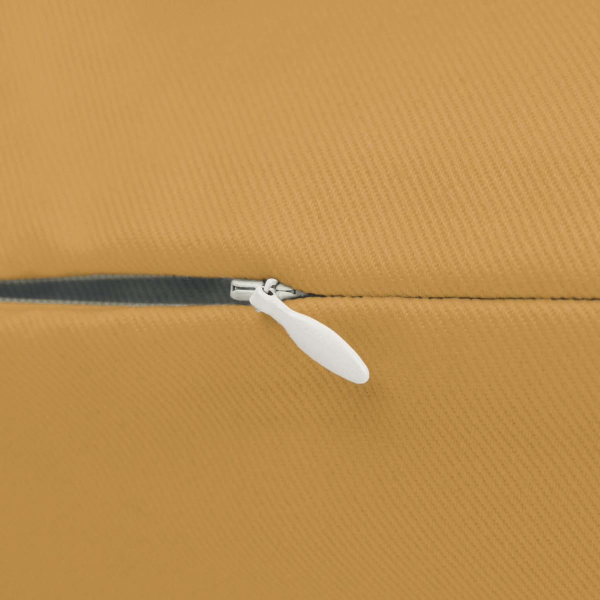 Detail of the zipper on the golden ochre Once You Lumberjack Pillow showcasing its quality craftsmanship.