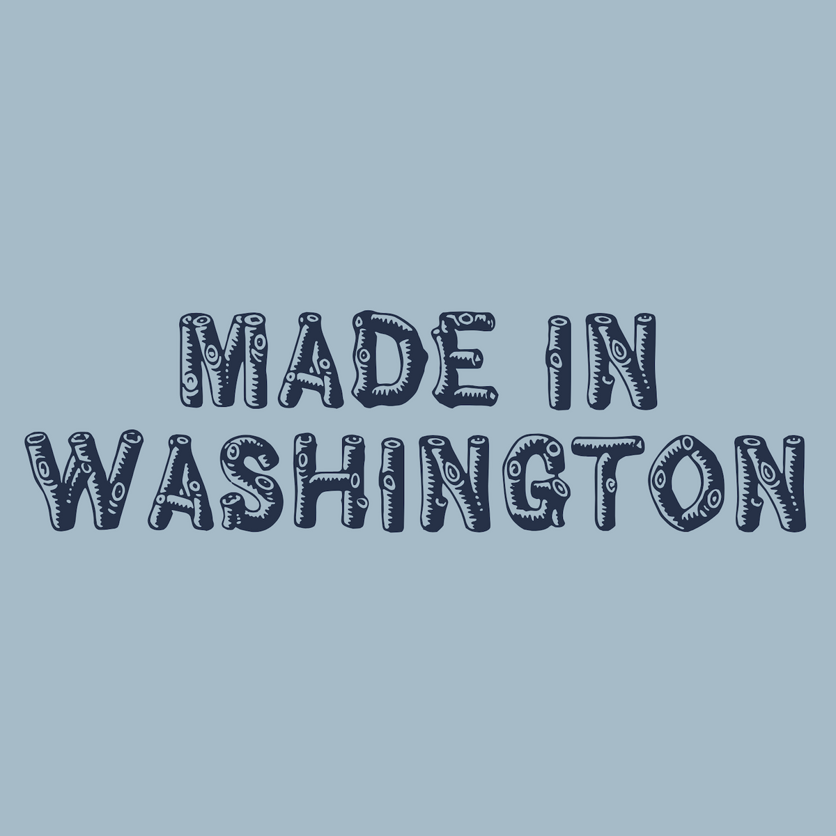 Made in Washington hoodie logo with wood log font on a blue background, showcasing Pacific Northwest pride.