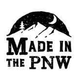 Made in the PNW hoodie logo featuring mountains and a crescent moon design.