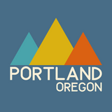Modern Peaks Portland t-shirt design featuring colorful mountains and the text 'Portland Oregon' in a minimalist style.