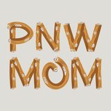 Stylized 'PNW MOM' lettering in a log design, representing Pacific Northwest vibes for moms.