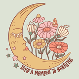 Take a Moment to Breathe T Shirt design featuring a crescent moon and wildflowers.