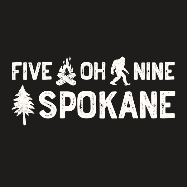 Five Oh Nine Roots Spokane Weekender Bag graphic featuring sasquatch, campfire, and tree designs.