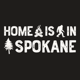 Home is in Spokane Weekender Bag design with campfire, sasquatch, and tree graphics.