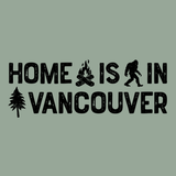 Home Is in Vancouver Tee graphic featuring campfire, Bigfoot, and tree designs in classic PNW style.
