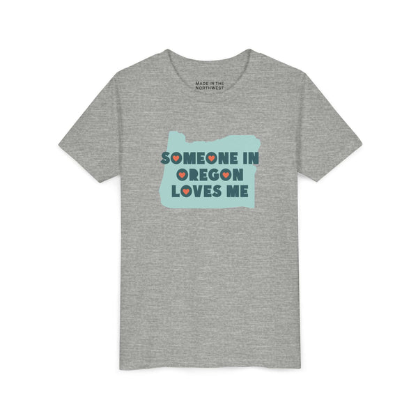 Someone in Oregon Loves Me Premium Soft Kids Tee with colorful graphic design on gray fabric.