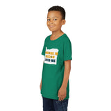 Someone in Oregon Loves Me Premium Soft Kids Tee modeled by a child, featuring a green shirt design.