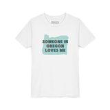 Someone in Oregon Loves Me Premium Soft Kids Tee featuring a soft white design with heart accents.